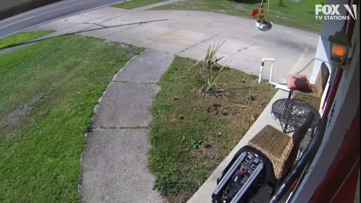Car slams into Titusville home during chase